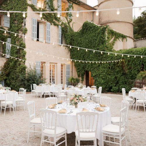 Diner in the courtyard with festoon lighting